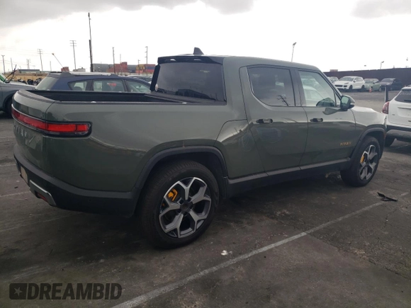 2022 Rivian R1T Launch Edition z VIN 7FCTGAAL0NN001256, wystawiony jako Copart lot #55850845 z przebiegiem 49 236 mil mil oraz Szkoda całkowita • Salvage title. Historia ofert i sprzedaży dostępna na DreamBid. Obrazek 3.