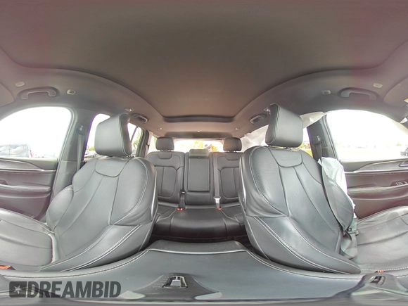 2023 Jeep Grand Cherokee Overland with VIN 1C4RJHDG0PC670537, listed as a Copart auction lot 56757285 with 24,735 mi miles and Salvage title. Bid and sale history available at DreamBid. Image 14.