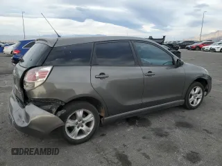 2008 Toyota Matrix STD with VIN 2T1KR30E28C706853, listed as a Copart auction lot 50926795 with 209,598 mi miles and Salvage Title. Bid and sale history available at DreamBid. Image 3.