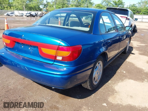 2002 Saturn SL with VIN 1G8ZK52742Z289921, listed as a IAAI auction lot 42340896 with 165,328 mi miles and . Bid and sale history available at DreamBid. Image 4.