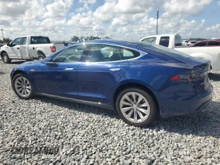 2016 Tesla Model S 90D with VIN 5YJSA1E29GF134975, listed as a Copart auction lot 61823295 with Not provided miles and Non repairable. Bid and sale history available at DreamBid. Image 2.