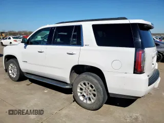 2020 GMC Yukon SLT with VIN 1GKS2BKCXLR215461, listed as a Copart auction lot 48857795 with 94,307 mi miles and Salvage Title. Bid and sale history available at carsss.com. Image 2.