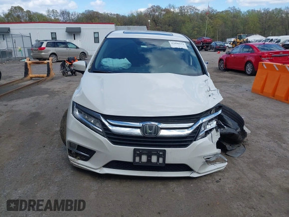 2018 Honda Odyssey Touring with VIN 5FNRL6H81JB023530, listed as a IAAI auction lot 42040124 with 109,128 mi miles and . Bid and sale history available at DreamBid. Image 12.