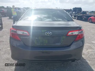 2012 Toyota Camry L with VIN 4T1BF1FK1CU165165, listed as a IAAI auction lot 41957566 with 127,048 mi miles. Bid and sale history available at carsss.com. Image 16.