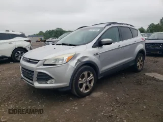 2014 Ford Escape SE z VIN 1FMCU9GX0EUD40706, wystawiony jako Copart lot #57073895 z przebiegiem 150 012 mil mil oraz Czysty tytuł • Clean title. Historia ofert i sprzedaży dostępna na DreamBid. Obrazek 1.