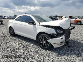 2013 Volkswagen Eos Sport с VIN WVWBW8AH8DV001948, выставлен на аукционе Copart как лот 56292615 с пробегом 75 398 миль миль и На запчасти • Non repairable. История ставок и продаж доступна на DreamBid. Изображение 4.