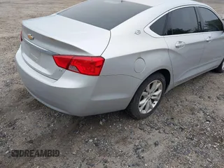 2018 Chevrolet Impala LT with VIN 1G1105S39JU135456, listed as a IAAI auction lot 42360696 with 124,176 mi miles and . Bid and sale history available at DreamBid. Image 4.