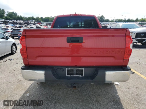 2021 Toyota Tundra SR with VIN 5TFUY5F11MX971951, listed as a Copart auction lot 64889875 with 69,297 mi miles and Salvage title. Bid and sale history available at DreamBid. Image 6.