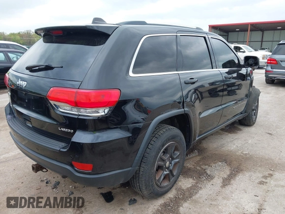 2017 Jeep Grand Cherokee Laredo with VIN 1C4RJFAG2HC649408, listed as a IAAI auction lot 42072440 with 58,818 mi miles and . Bid and sale history available at DreamBid. Image 4.