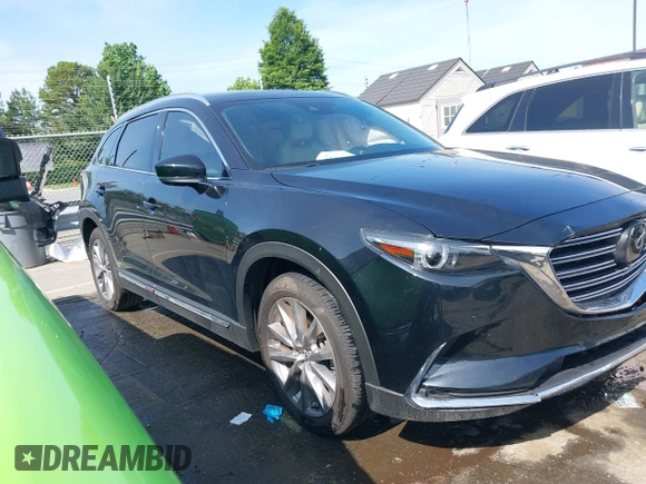 2021 Mazda CX-9 Carbon Edition with VIN JM3TCBDY3M0524241, listed as a IAAI auction lot 42538127 with 50,533 mi miles and . Bid and sale history available at DreamBid. Image 13.