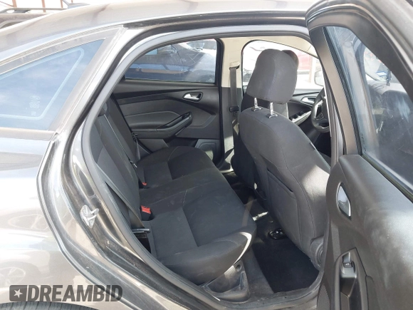 2015 Ford Focus SE with VIN 1FADP3F27FL374531, listed as a IAAI auction lot 42123579 with 128,884 mi miles and . Bid and sale history available at DreamBid. Image 8.