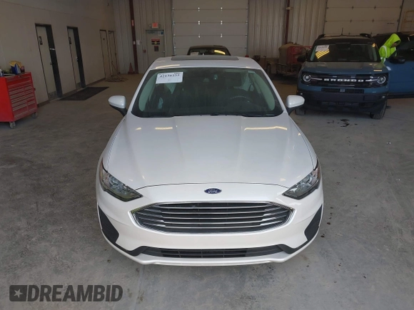 2020 Ford Fusion SE with VIN 3FA6P0HD4LR165511, listed as a IAAI auction lot 42136252 with 30,709 mi miles and . Bid and sale history available at DreamBid. Image 12.
