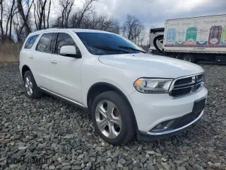 2014 Dodge Durango Limited with VIN 1C4RDJDG2EC287002, listed as a Copart auction lot 50779135 with 211,323 mi miles and Clean Title. Bid and sale history available at carsss.com. Image 4.