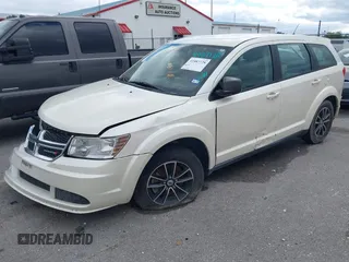 2014 Dodge Journey SE with VIN 3C4PDCAB1ET192530, listed as a IAAI auction lot 41987728 with 186,486 mi miles and . Bid and sale history available at carsss.com. Image 6.