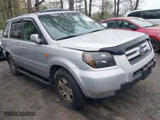 2006 Honda Pilot EX-L with RES with VIN 5FNYF286X6B043597, listed as a IAAI auction lot 41940460 with 325,118 mi miles. Bid and sale history available at carsss.com. Image 1.