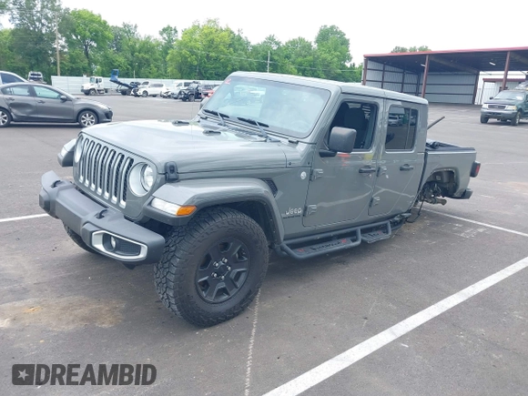 2021 Jeep Gladiator High Altitude with VIN 1C6HJTFG1ML597807, listed as a IAAI auction lot 42336812 with 46,450 mi miles and . Bid and sale history available at DreamBid. Image 2.