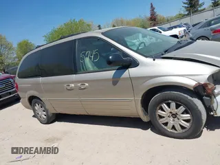2005 Chrysler Town & Country Touring z VIN 2C4GP54L45R123762, wystawiony jako IAAI lot #42235745 z przebiegiem 217 713 mil mil oraz . Historia ofert i sprzedaży dostępna na DreamBid. Obrazek 13.