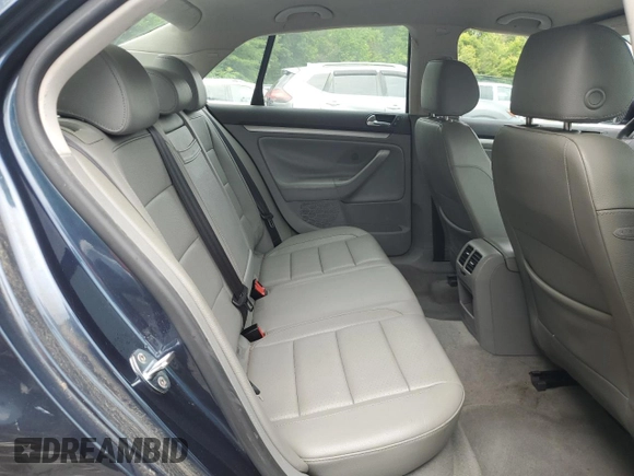 2005 Volkswagen Jetta 2.5L with VIN 3VWRG71K45M628981, listed as a Copart auction lot 58531595 with 128,217 mi miles and Salvage title. Bid and sale history available at DreamBid. Image 10.