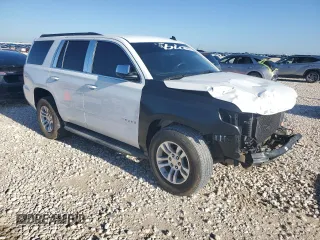 2015 Chevrolet Tahoe LS with VIN 1GNSCAKC8FR121612, listed as a Copart auction lot 56363785 with 239,214 mi miles and Salvage title. Bid and sale history available at DreamBid. Image 4.