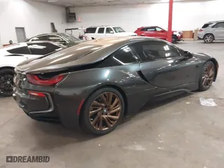 2016 BMW i8 with VIN WBY2Z2C50GV674856, listed as a IAAI auction lot 40862121 with 51,700 mi miles. Bid and sale history available at carsss.com. Image 4.