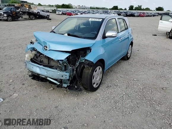 2014 Scion xD with VIN JTKKUPB41E1044556, listed as a Copart auction lot 57123795 with Not provided miles and Salvage title. Bid and sale history available at DreamBid. Image 13.