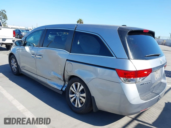 2016 Honda Odyssey SE with VIN 5FNRL5H32GB153002, listed as a IAAI auction lot 42084022 with 63,764 mi miles and . Bid and sale history available at DreamBid. Image 3.