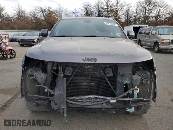 2020 Jeep Grand Cherokee Laredo E with VIN 1C4RJFAG3LC104570, listed as a Copart auction lot 76829984 with 73,348 mi miles and Non Repairable. Bid and sale history available at carsss.com. Image 5.
