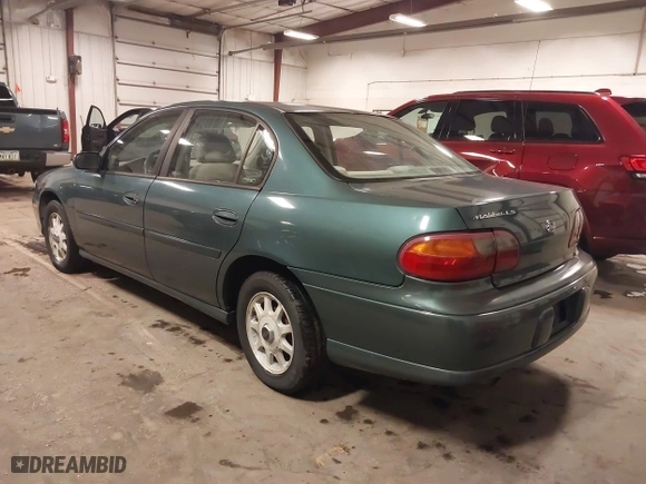 1998 Chevrolet Malibu LS with VIN 1G1NE52M6W6104642, listed as a IAAI auction lot 41636923 with 116,944 mi miles. Bid and sale history available at carsss.com. Image 3.