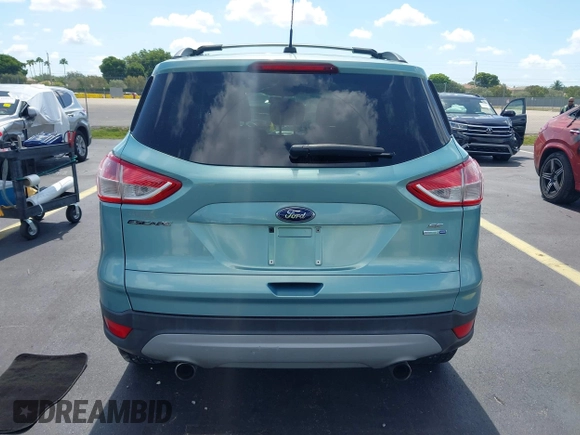 2013 Ford Escape SE with VIN 1FMCU9GX0DUC75662, listed as a IAAI auction lot 42549360 with 156,666 mi miles and . Bid and sale history available at DreamBid. Image 16.