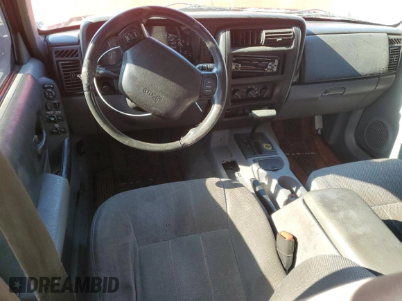 1998 Jeep Cherokee Sport with VIN 1J4FT68S8WL251781, listed as a Copart auction lot 71562574 with 267,648 mi miles and Non Repairable. Bid and sale history available at carsss.com. Image 8.
