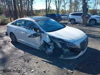 2016 Hyundai Sonata Hybrid Limited with VIN KMHE34L18GA017816, listed as a IAAI auction lot 40979824 with 85,466 mi miles. Bid and sale history available at carsss.com. Image 1.