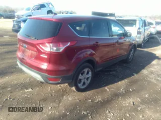 2016 Ford Escape SE with VIN 1FMCU0GX4GUA90479, listed as a IAAI auction lot 38187435 with 82,635 mi miles. Bid and sale history available at carsss.com. Image 4.