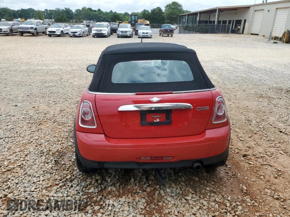 2012 MINI Convertible z VIN WMWZN3C51CT133755, wystawiony jako Copart lot #59588145 z przebiegiem 100 292 mil mil oraz Szkoda całkowita • Salvage title. Historia ofert i sprzedaży dostępna na DreamBid. Obrazek 6.