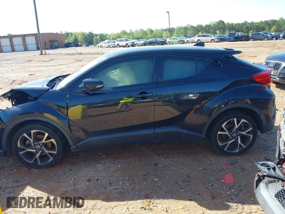 2019 Toyota C-HR XLE with VIN JTNKHMBX0K1023547, listed as a IAAI auction lot 41982484 with 119,533 mi miles and . Bid and sale history available at DreamBid. Image 14.