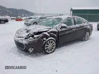 2014 Toyota Avalon Limited with VIN 4T1BK1EB1EU106004, listed as a IAAI auction lot 41341771 with 86,608 mi miles and . Bid and sale history available at DreamBid. Image 2.