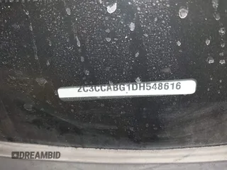 2013 Chrysler 300 with VIN 2C3CCABG1DH548616, listed as a IAAI auction lot 41376584 with 122,369 mi miles. Bid and sale history available at carsss.com. Image 9.