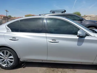 2014 Infiniti Q50 Premium with VIN JN1BV7AP2EM691601, listed as a IAAI auction lot 42323769 with 93,413 mi miles and . Bid and sale history available at DreamBid. Image 14.