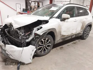2023 Toyota Corolla Cross Hybrid S with VIN 7MUFBABG0PV004809, listed as a IAAI auction lot 41489550 with 59,172 mi miles and . Bid and sale history available at DreamBid. Image 6.