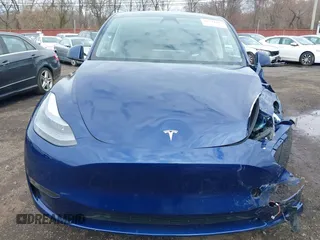 2023 Tesla Model Y Long Range with VIN 7SAYGDEE4PF891709, listed as a IAAI auction lot 41944893 with 15,864 mi miles. Bid and sale history available at carsss.com. Image 12.