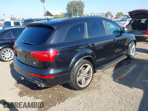 2015 Audi Q7 3.0L TDI Prestige with VIN WA1WMAFE2FD022262, listed as a IAAI auction lot 41969144 with 271,507 mi miles. Bid and sale history available at carsss.com. Image 4.