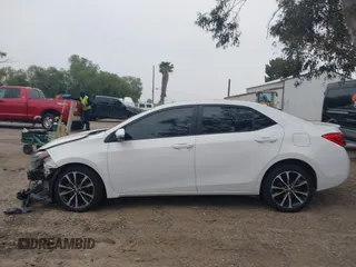 2019 Toyota Corolla L with VIN 5YFBURHE3KP895705, listed as a IAAI auction lot 42034995 with 173,719 mi miles and . Bid and sale history available at DreamBid. Image 15.