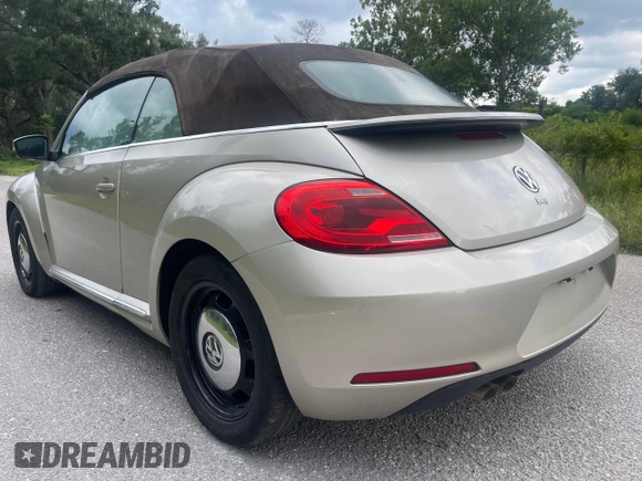2013 Volkswagen Beetle 2.5L with VIN 3VW5X7AT2DM825928, listed as a Copart auction lot 66500855 with 48,795 mi miles and Salvage title. Bid and sale history available at DreamBid. Image 3.