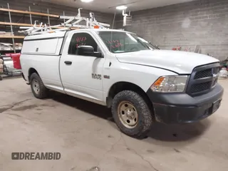 2015 Ram 1500 Tradesman with VIN 3C6JR7DT5FG660649, listed as a IAAI auction lot 41672656 with 156,189 mi miles and . Bid and sale history available at DreamBid. Image 1.