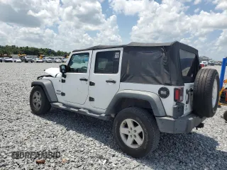 2012 Jeep Wrangler Unlimited Sport with VIN 1C4BJWDG6CL240673, listed as a Copart auction lot 60669625 with Not provided miles and Salvage title. Bid and sale history available at DreamBid. Image 2.
