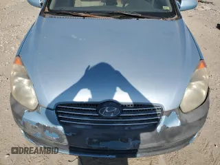 2006 Hyundai Accent GLS z VIN KMHCN46C56U050963, wystawiony jako Copart lot #60979955 z przebiegiem Nie podano mil oraz Czysty tytuł • Clean title. Historia ofert i sprzedaży dostępna na DreamBid. Obrazek 11.