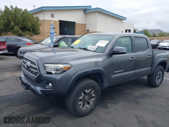 2017 Toyota Tacoma SR5 z VIN 3TMAZ5CN7HM045752, wystawiony jako IAAI lot #42057874 z przebiegiem 89 898 mil mil oraz . Historia ofert i sprzedaży dostępna na DreamBid. Obrazek 18.