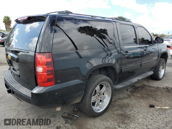 2013 Chevrolet Suburban LT with VIN 1GNSKJE76DR318499, listed as a Copart auction lot 71840624 with 191,050 mi miles and Salvage Title. Bid and sale history available at carsss.com. Image 3.