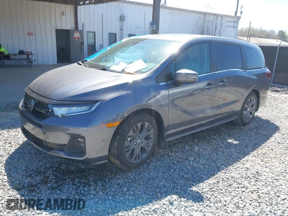 2025 Honda Odyssey Touring z VIN 5FNRL6H84SB028769, wystawiony jako IAAI lot #41856080 z przebiegiem Nie podano mil oraz . Historia ofert i sprzedaży dostępna na DreamBid. Obrazek 2.