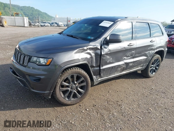 2017 Jeep Grand Cherokee Laredo z VIN 1C4RJFAG1HC744669, wystawiony jako IAAI lot #42269885 z przebiegiem 123 271 mil mil oraz . Historia ofert i sprzedaży dostępna na DreamBid. Obrazek 17.