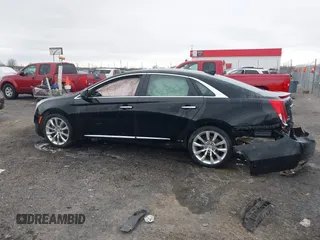 2015 Cadillac XTS Luxury with VIN 2G61M5S38F9138545, listed as a IAAI auction lot 41690696 with 136,460 mi miles and . Bid and sale history available at DreamBid. Image 14.